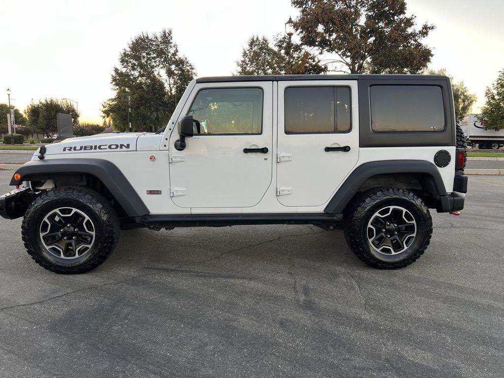 used 2013 Jeep Wrangler Unlimited car, priced at $21,998