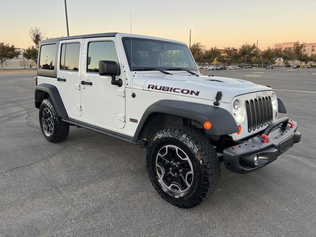 used 2013 Jeep Wrangler Unlimited car, priced at $21,998