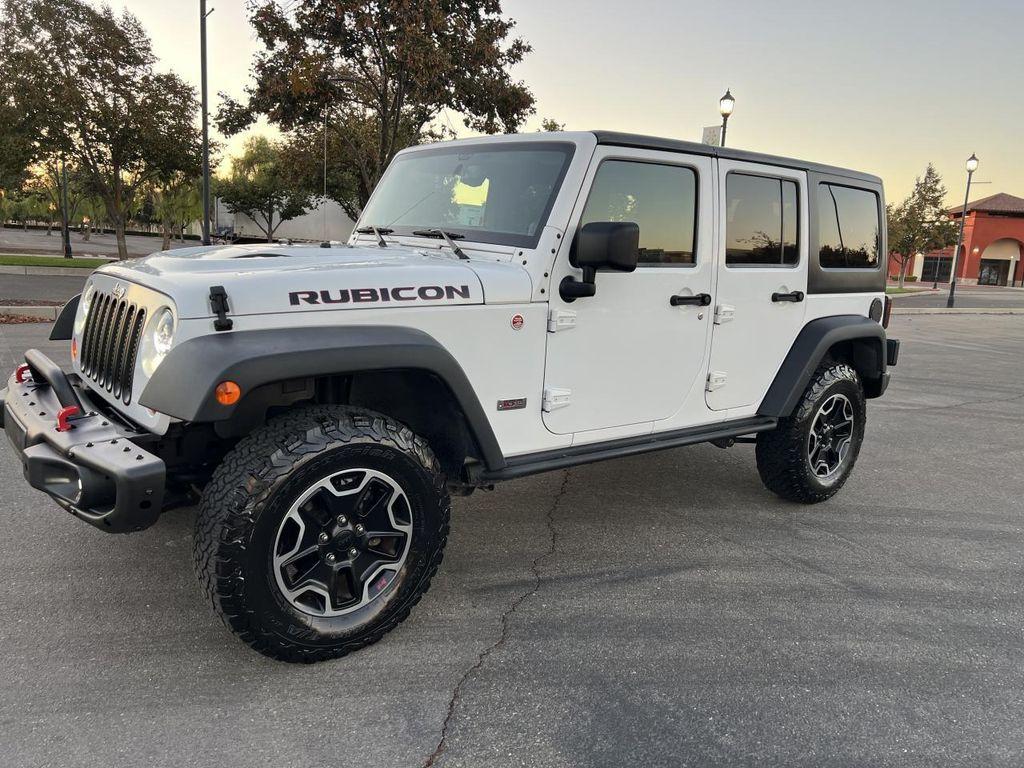 used 2013 Jeep Wrangler Unlimited car, priced at $21,998