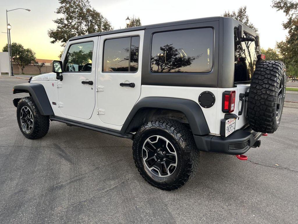 used 2013 Jeep Wrangler Unlimited car, priced at $21,998