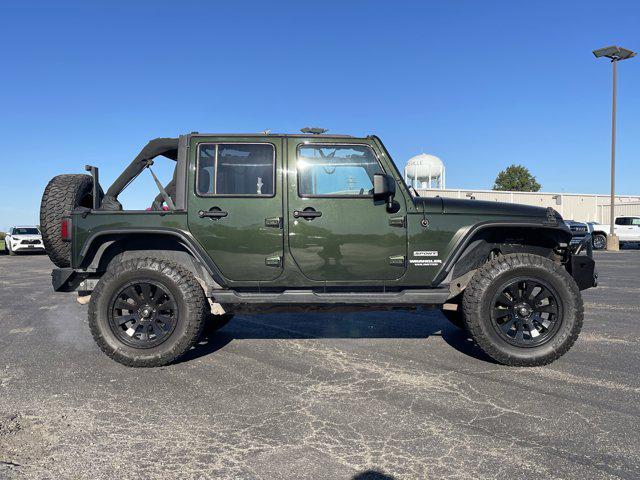 used 2011 Jeep Wrangler Unlimited car, priced at $16,500