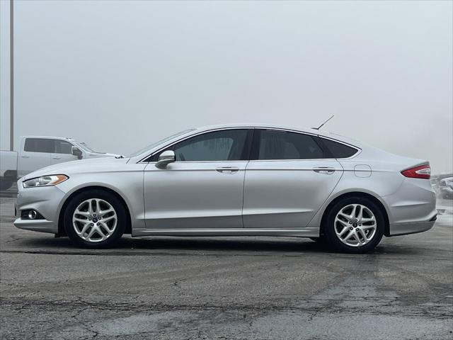 used 2016 Ford Fusion car, priced at $9,000