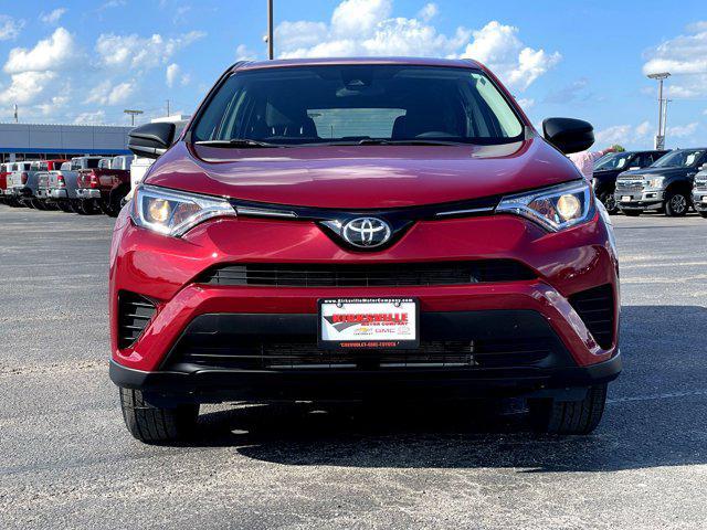 used 2018 Toyota RAV4 car, priced at $20,000