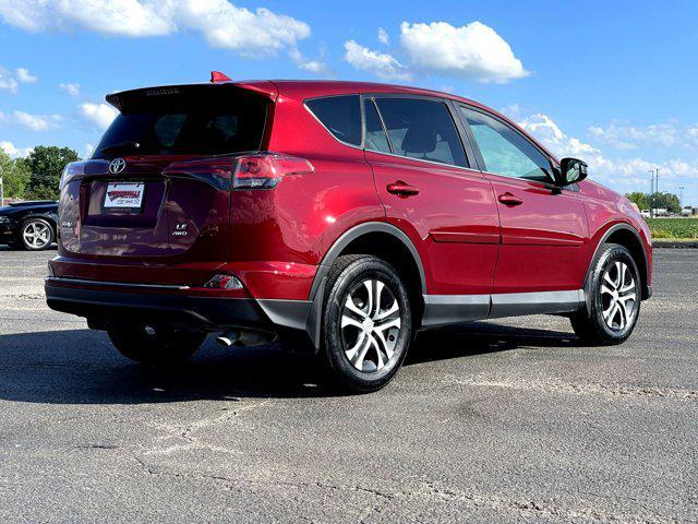 used 2018 Toyota RAV4 car, priced at $20,000