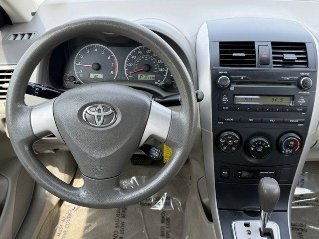 used 2010 Toyota Corolla car, priced at $7,000