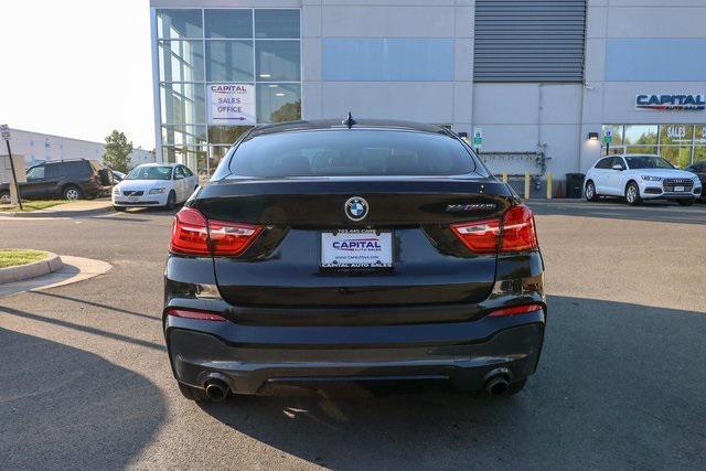 used 2018 BMW X4 car, priced at $20,588
