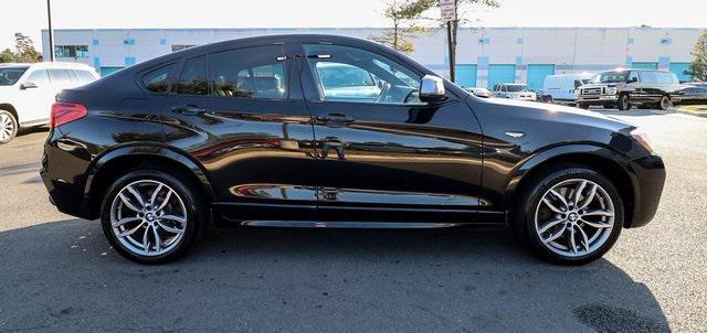 used 2018 BMW X4 car, priced at $20,588