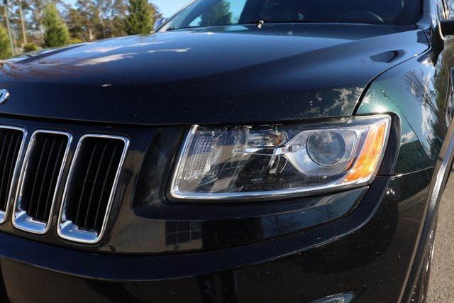 used 2014 Jeep Grand Cherokee car, priced at $10,804