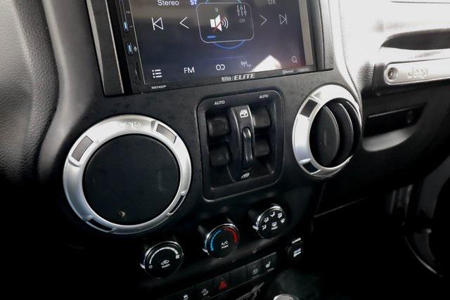 used 2015 Jeep Wrangler Unlimited car, priced at $21,388