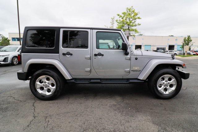 used 2015 Jeep Wrangler Unlimited car, priced at $21,388