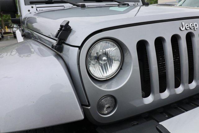 used 2015 Jeep Wrangler Unlimited car, priced at $21,388