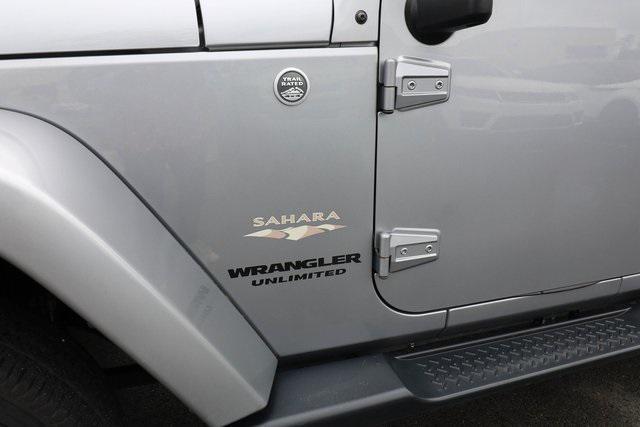 used 2015 Jeep Wrangler Unlimited car, priced at $21,388