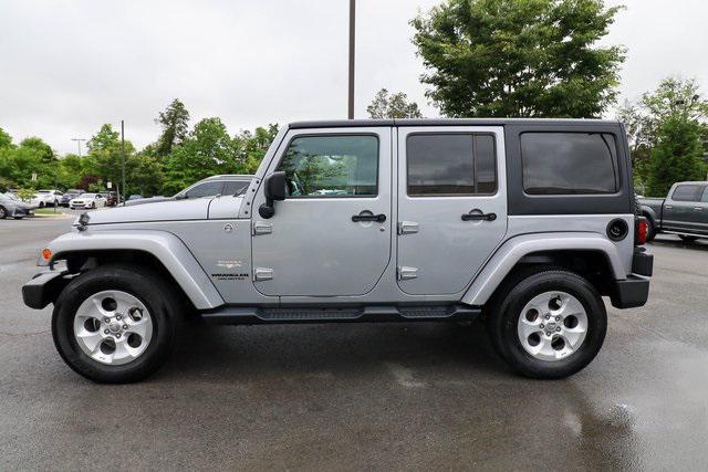 used 2015 Jeep Wrangler Unlimited car, priced at $21,388