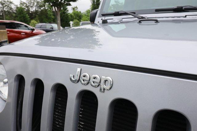 used 2015 Jeep Wrangler Unlimited car, priced at $21,388