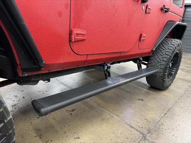 used 2015 Jeep Wrangler Unlimited car, priced at $29,900