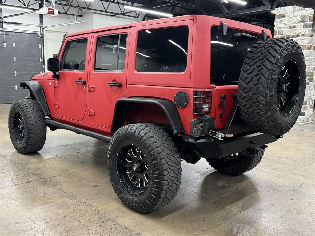 used 2015 Jeep Wrangler Unlimited car, priced at $27,900