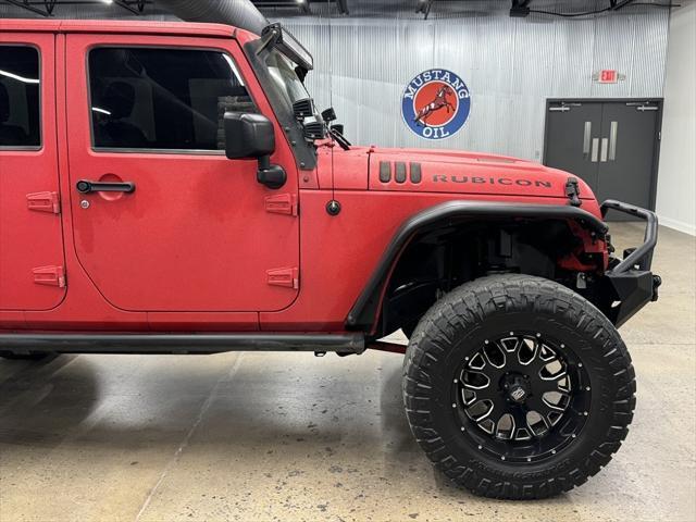 used 2015 Jeep Wrangler Unlimited car, priced at $29,900