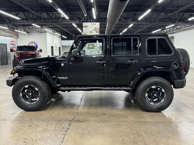 used 2012 Jeep Wrangler Unlimited car, priced at $16,900