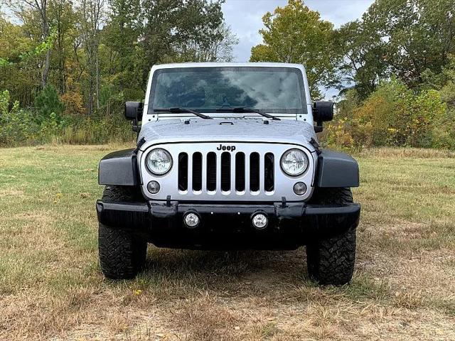 used 2016 Jeep Wrangler Unlimited car, priced at $25,900