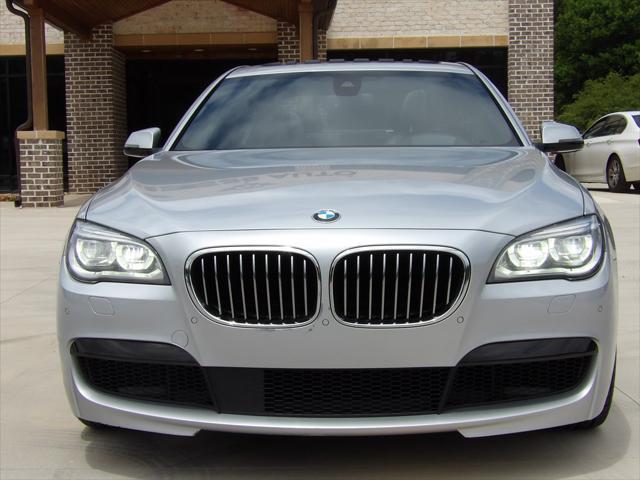 used 2015 BMW 750 car, priced at $21,995