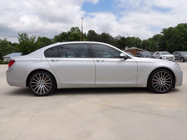 used 2015 BMW 750 car, priced at $21,995