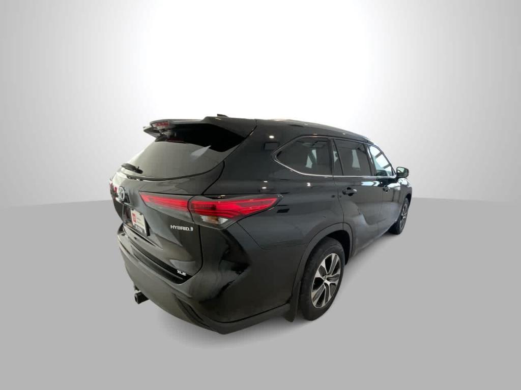 used 2021 Toyota Highlander Hybrid car, priced at $32,677