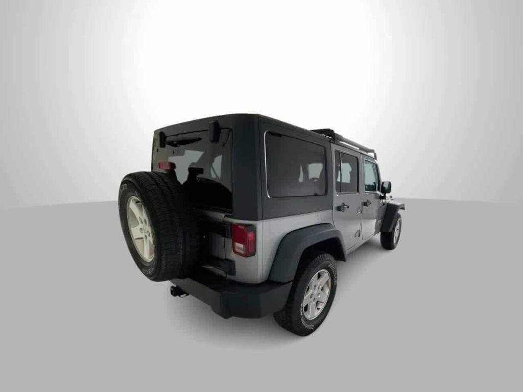 used 2014 Jeep Wrangler Unlimited car, priced at $19,258