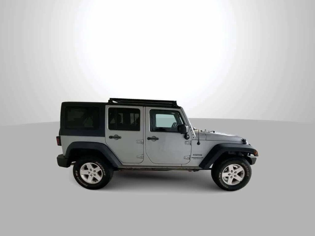 used 2014 Jeep Wrangler Unlimited car, priced at $19,258