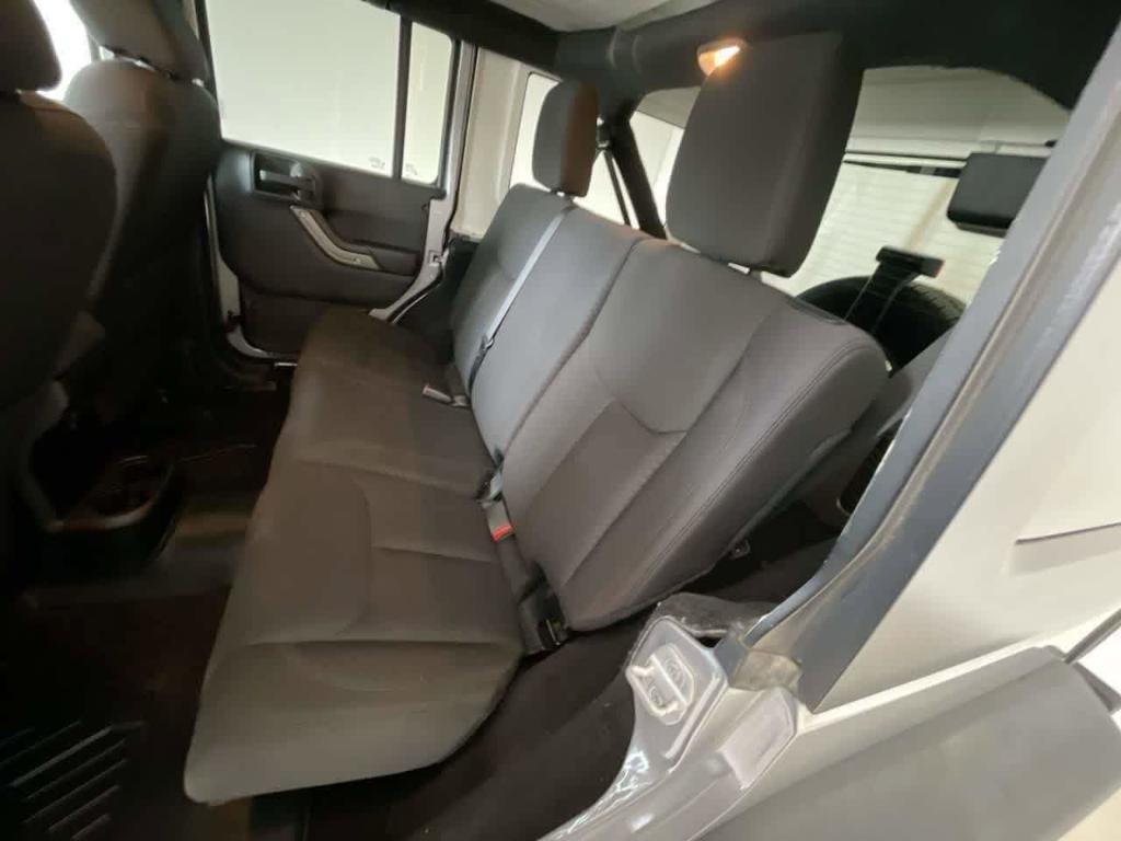 used 2014 Jeep Wrangler Unlimited car, priced at $19,258
