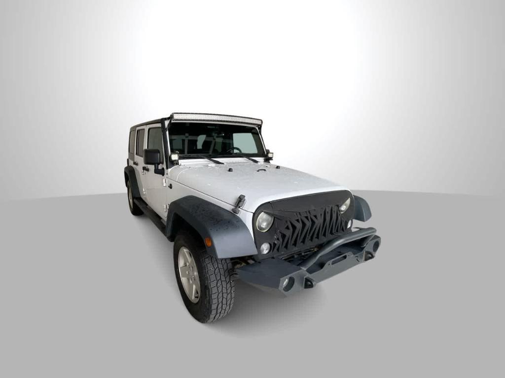 used 2015 Jeep Wrangler Unlimited car, priced at $15,165