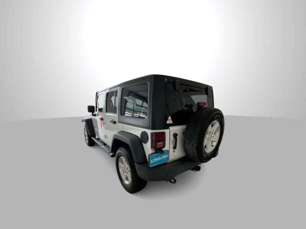 used 2015 Jeep Wrangler Unlimited car, priced at $15,165