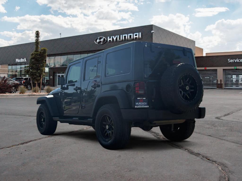 used 2016 Jeep Wrangler Unlimited car, priced at $16,590