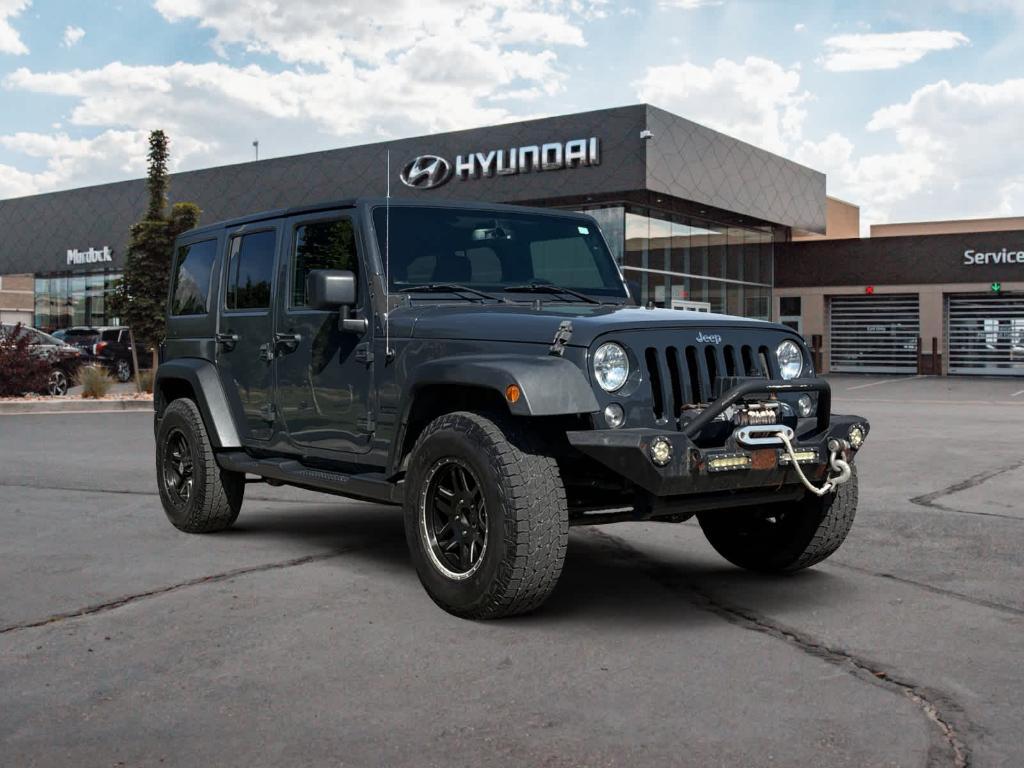 used 2016 Jeep Wrangler Unlimited car, priced at $16,590