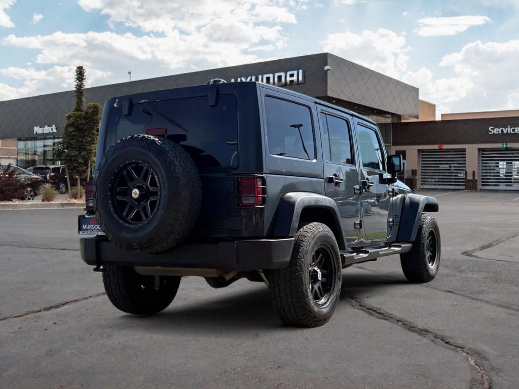 used 2016 Jeep Wrangler Unlimited car, priced at $16,590