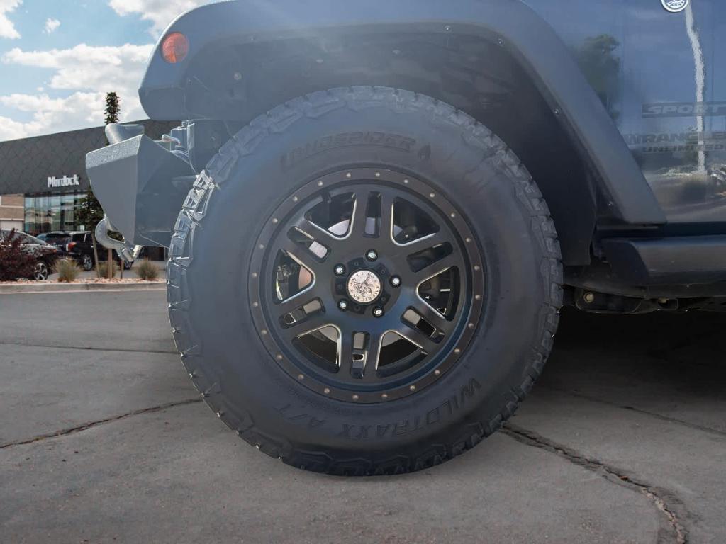 used 2016 Jeep Wrangler Unlimited car, priced at $16,590