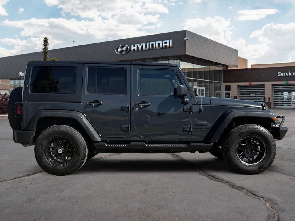 used 2016 Jeep Wrangler Unlimited car, priced at $16,590