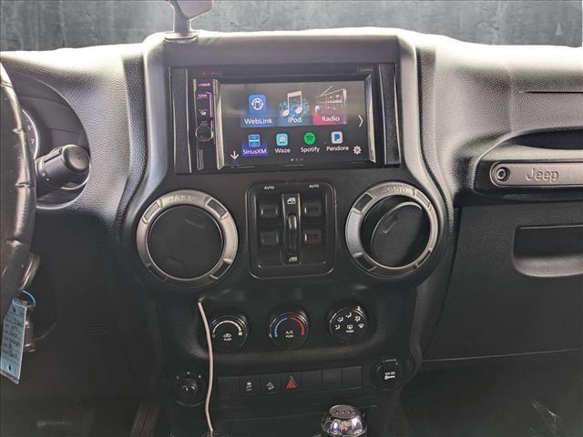 used 2014 Jeep Wrangler Unlimited car, priced at $16,990