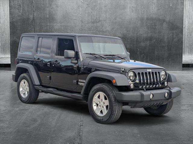 used 2014 Jeep Wrangler Unlimited car, priced at $16,990