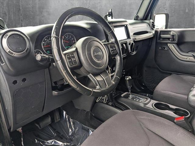 used 2014 Jeep Wrangler Unlimited car, priced at $16,990