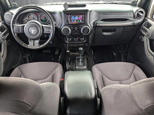 used 2014 Jeep Wrangler Unlimited car, priced at $16,990