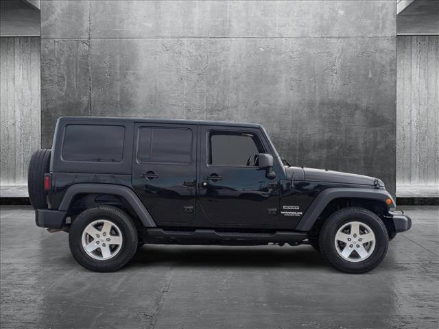 used 2014 Jeep Wrangler Unlimited car, priced at $16,990