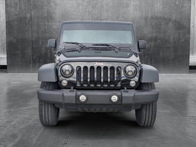 used 2014 Jeep Wrangler Unlimited car, priced at $16,990