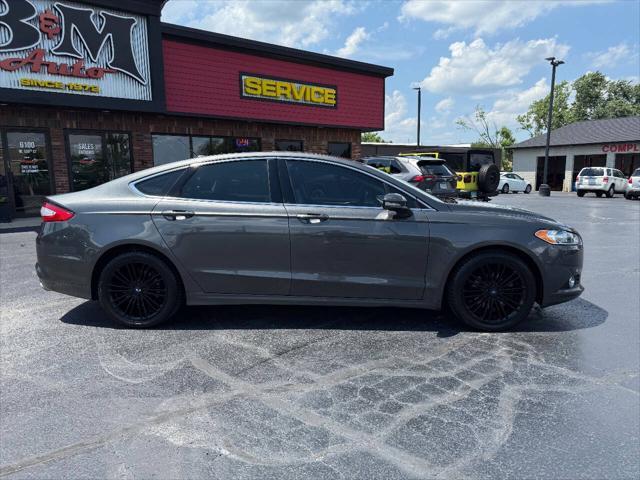 used 2016 Ford Fusion car, priced at $10,900