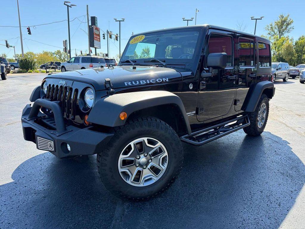 used 2013 Jeep Wrangler Unlimited car, priced at $16,900