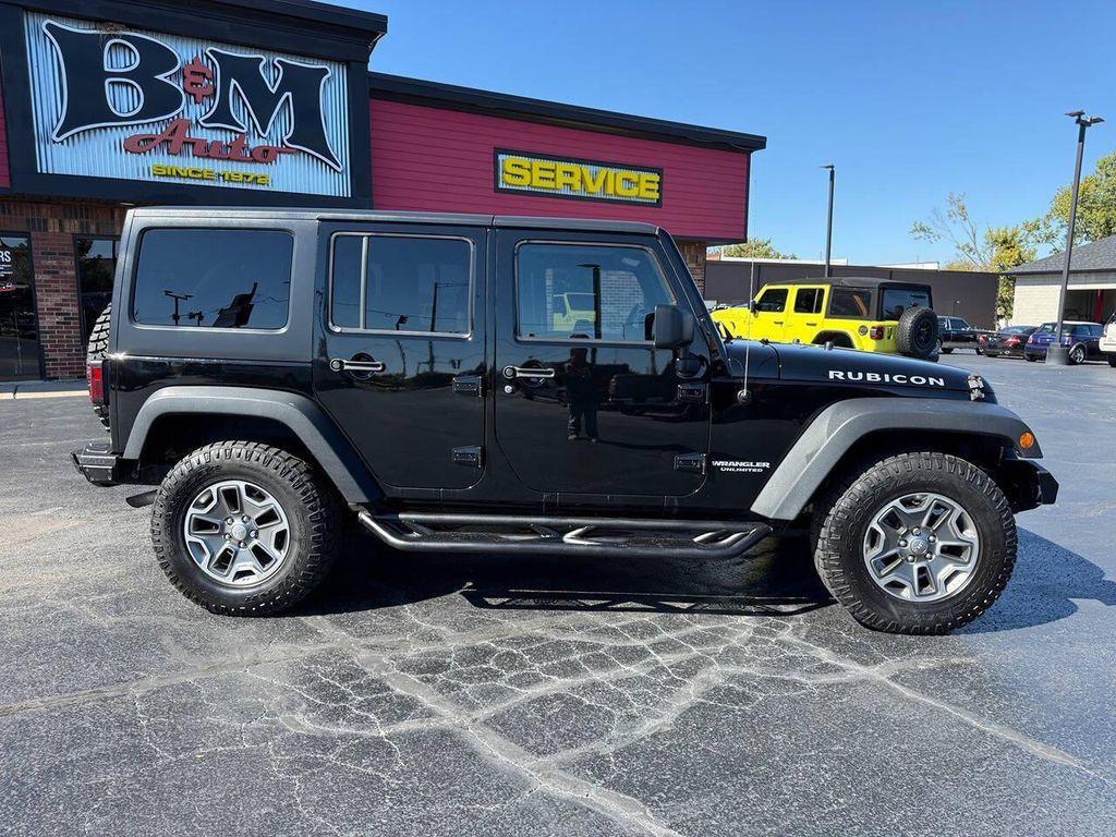 used 2013 Jeep Wrangler Unlimited car, priced at $16,900