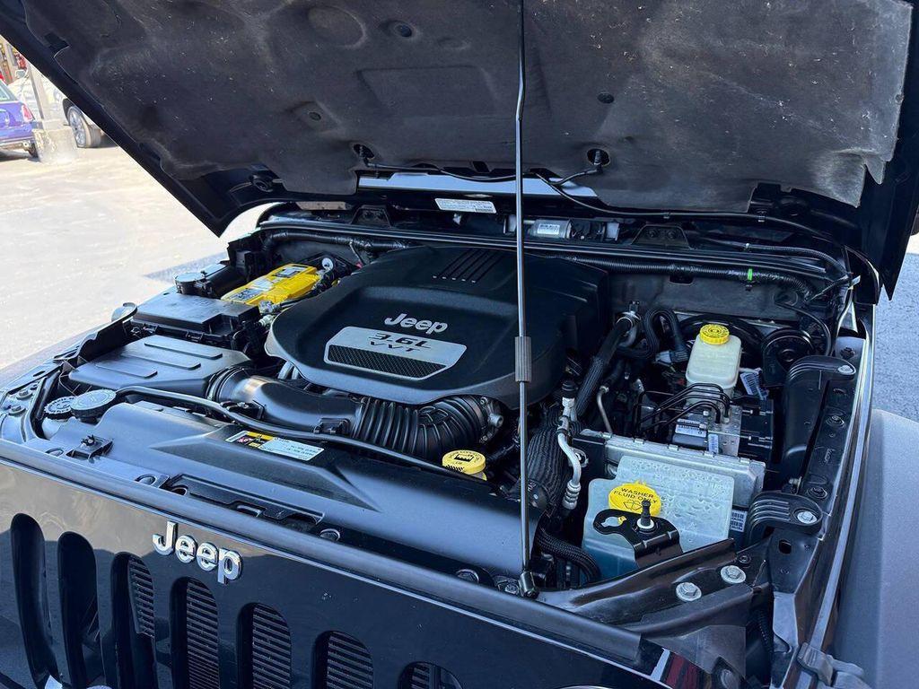 used 2013 Jeep Wrangler Unlimited car, priced at $16,900