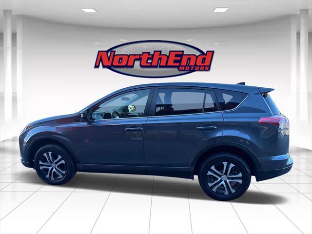 used 2018 Toyota RAV4 car, priced at $14,999