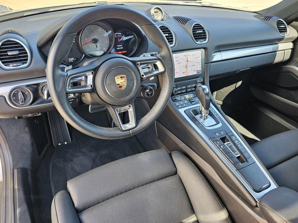 new 2024 Porsche 718 Boxster car, priced at $103,300