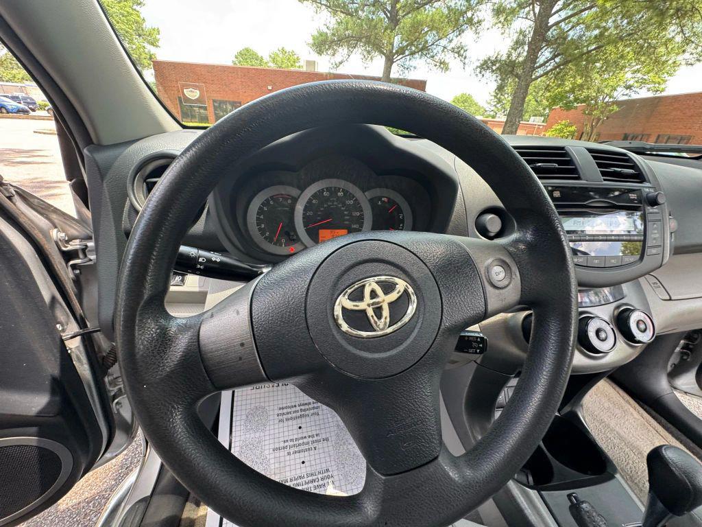 used 2011 Toyota RAV4 car, priced at $12,999