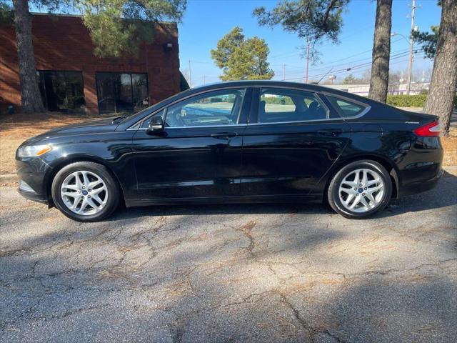 used 2016 Ford Fusion car, priced at $8,900